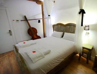 Een van de kamers Een van de kamers