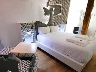 Een van de kamers Een van de kamers